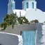 Eglise grecque typique au dessus du port d'Athinios - Santorin